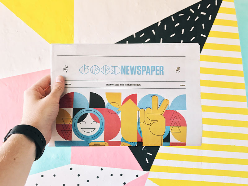 Person Holding Newspaper Person Holding Newspaper